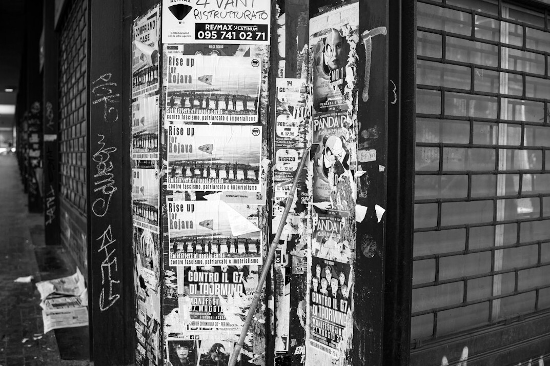 Stack of printed newspapers on a table
